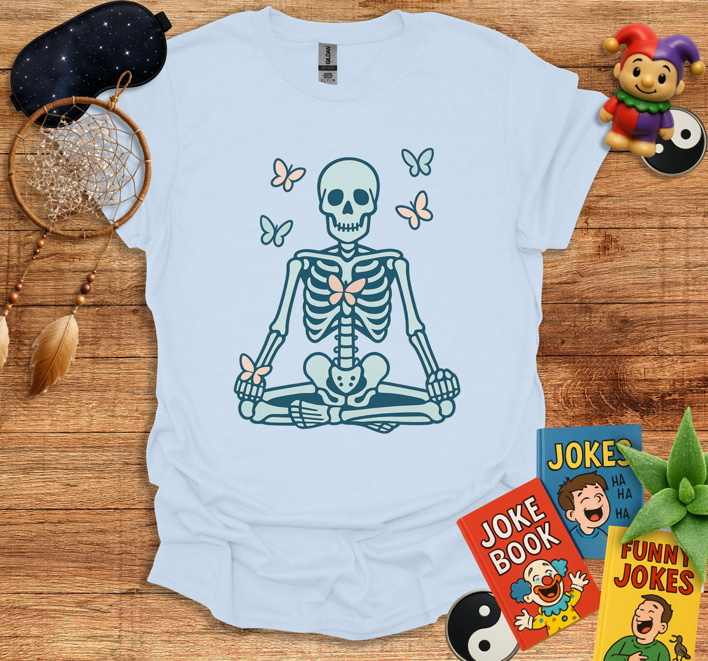 Skeleton Meditating with Butterflies Graphic Art T-Shirt